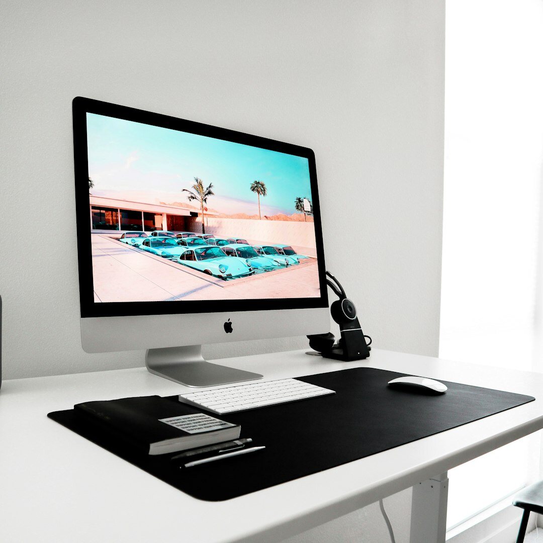 Clean minimalist home office desk with organized supplies