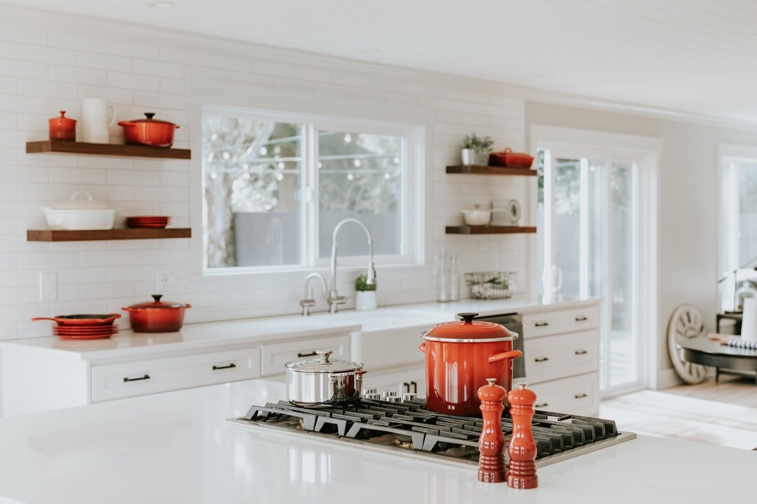 Beautifully organized kitchen with clean countertops and storage